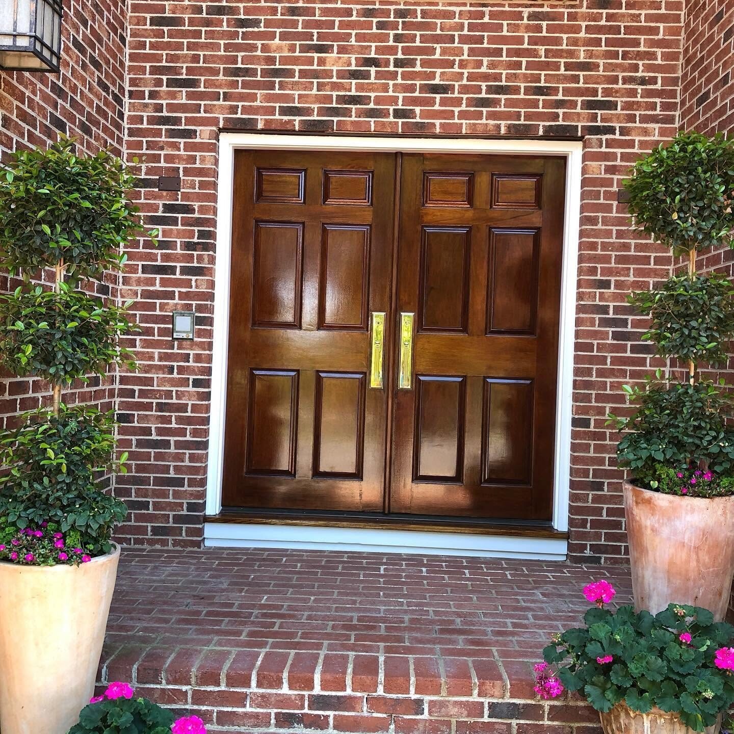 Brick entry with refinished double doors