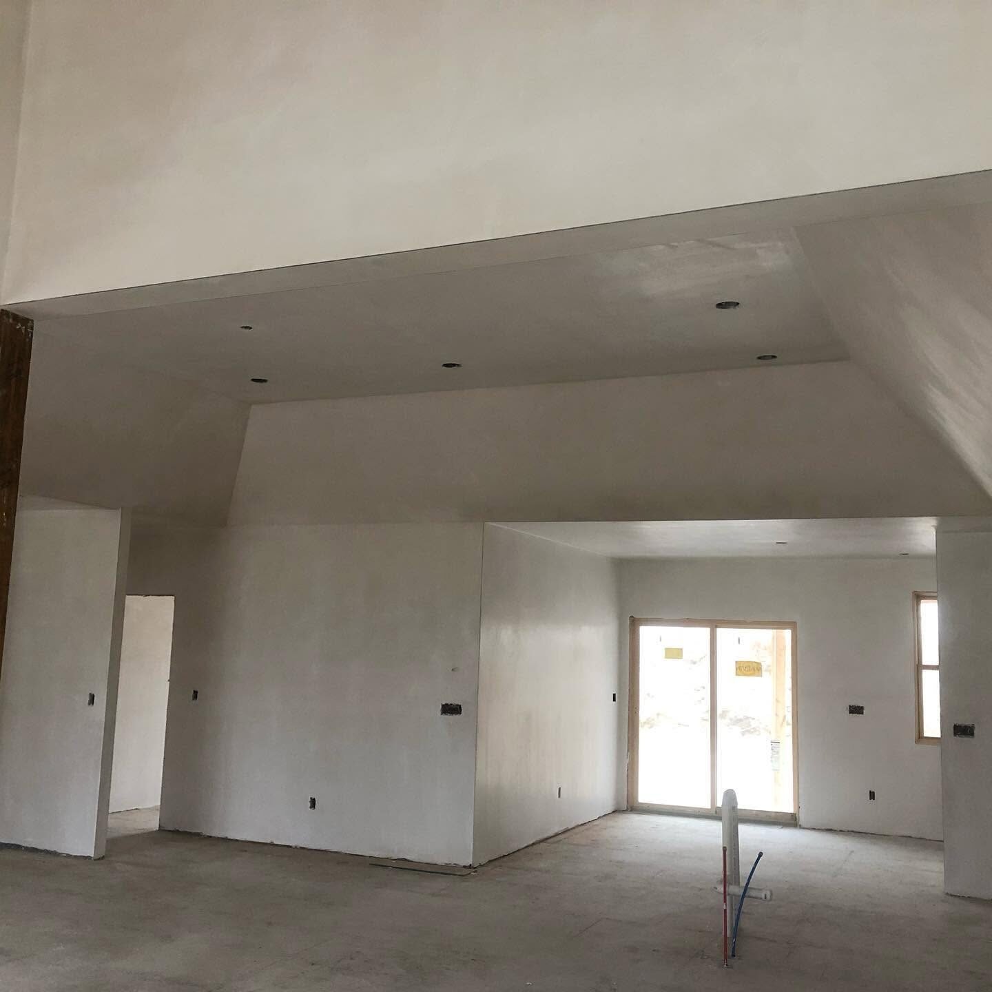 Finished sheetrock rooms primed and ready for paint