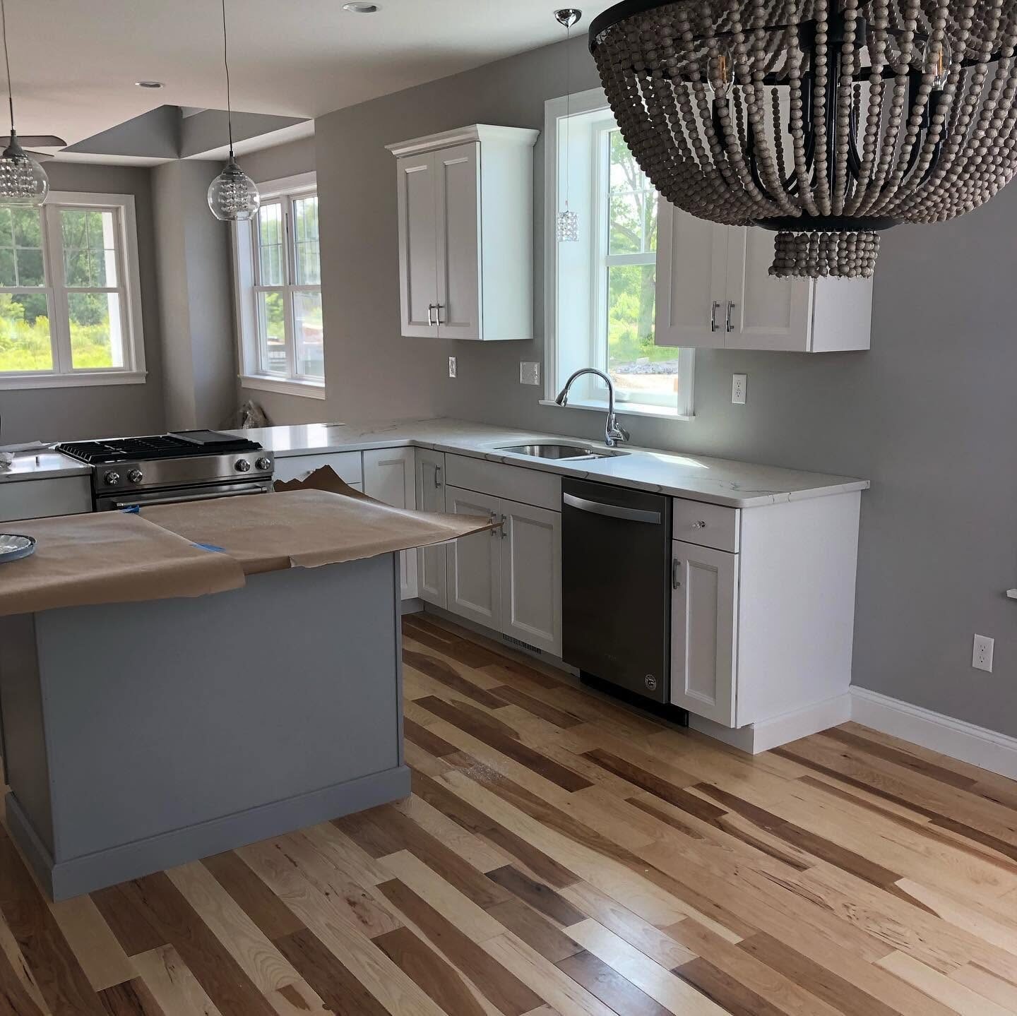 Kitchen with painted cabinets and island