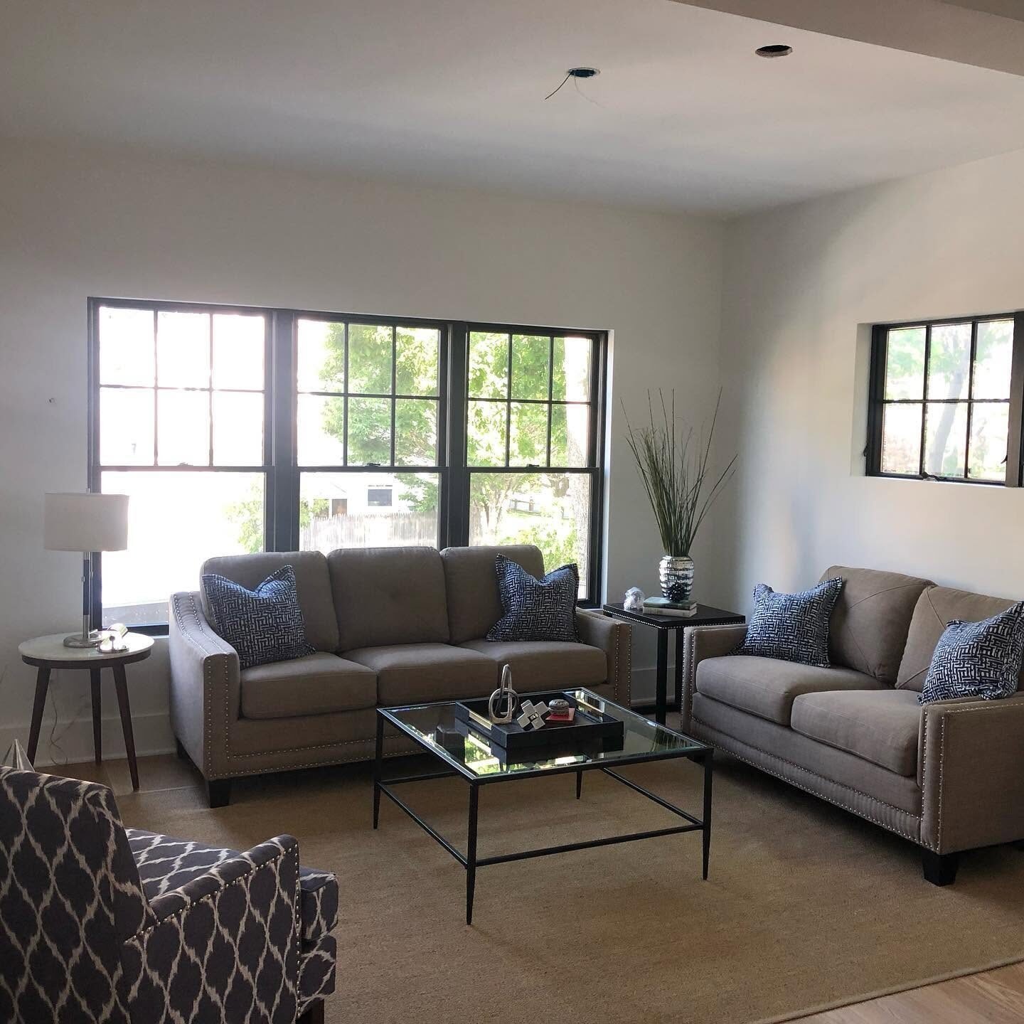 Finished living room with painted walls and trim