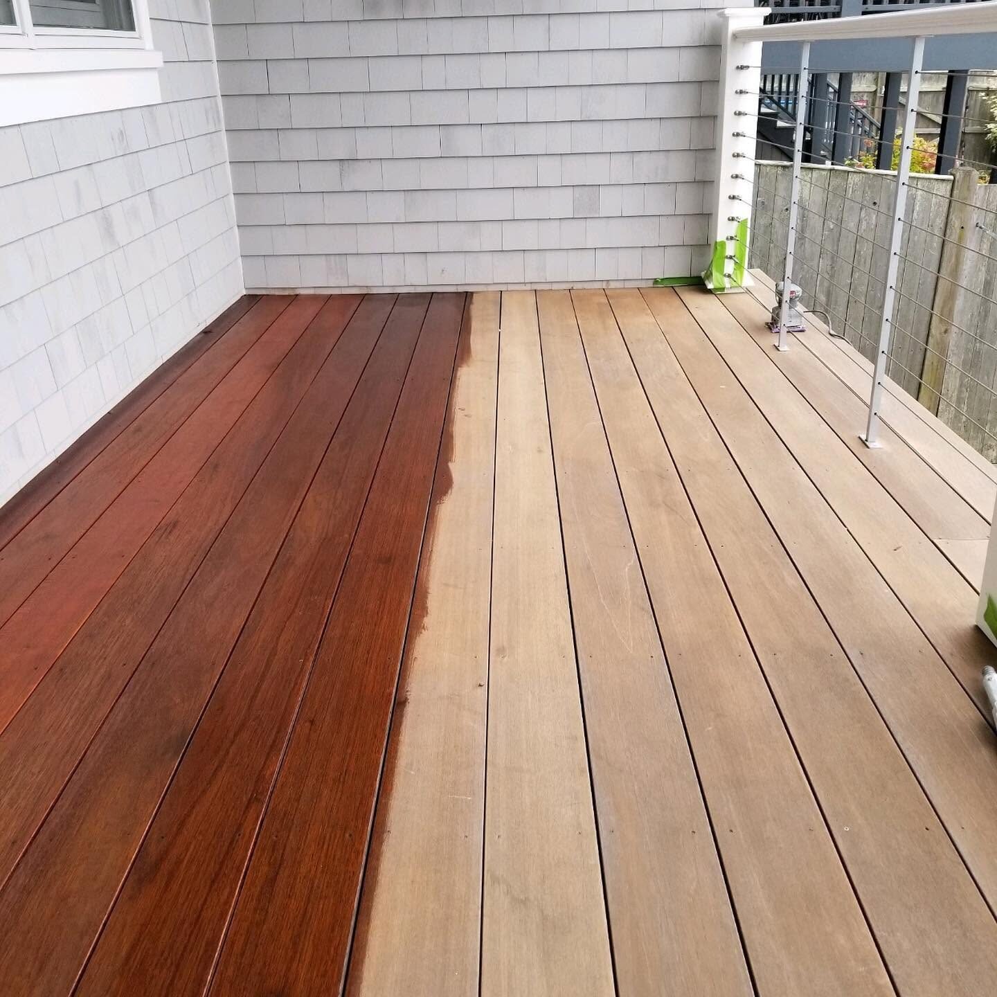 Mahogany deck half stained to show before and after
