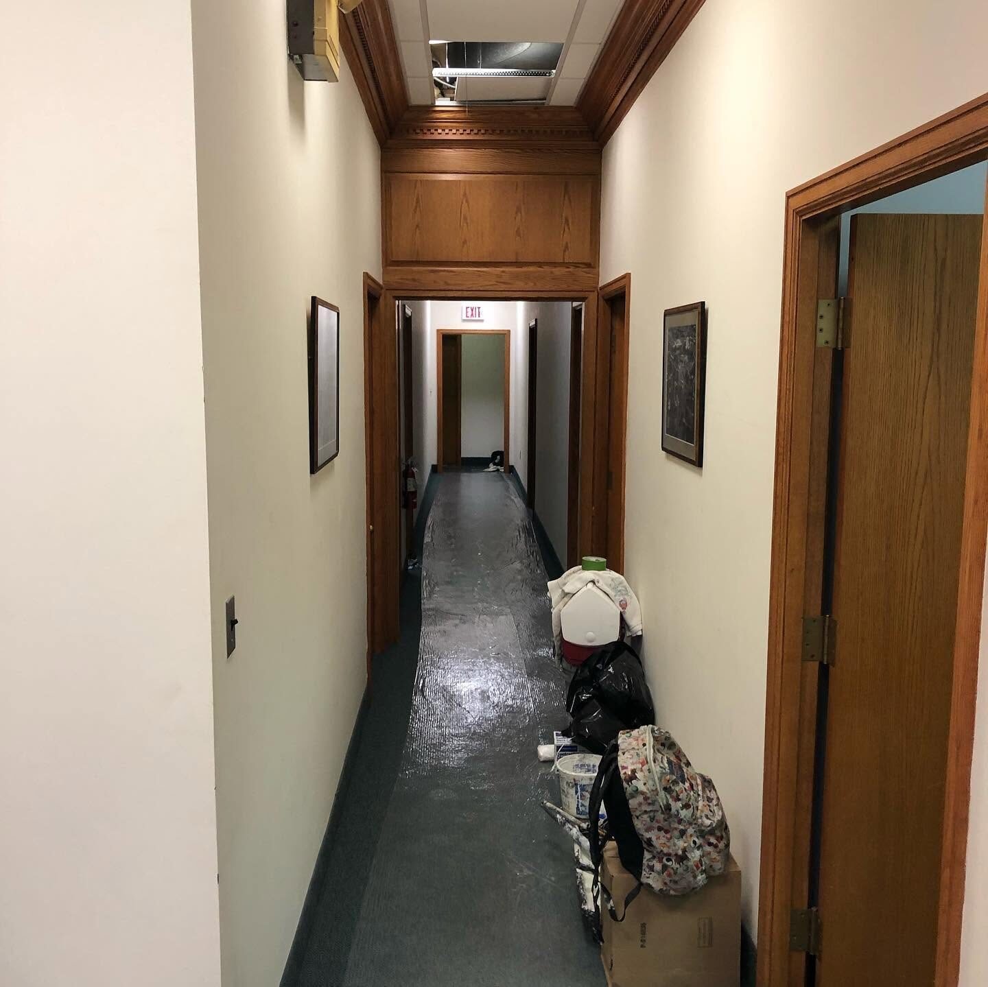 Office corridor painted with stained wood trim
