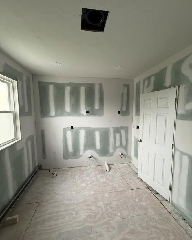 Sheetrock seams taped and mudded